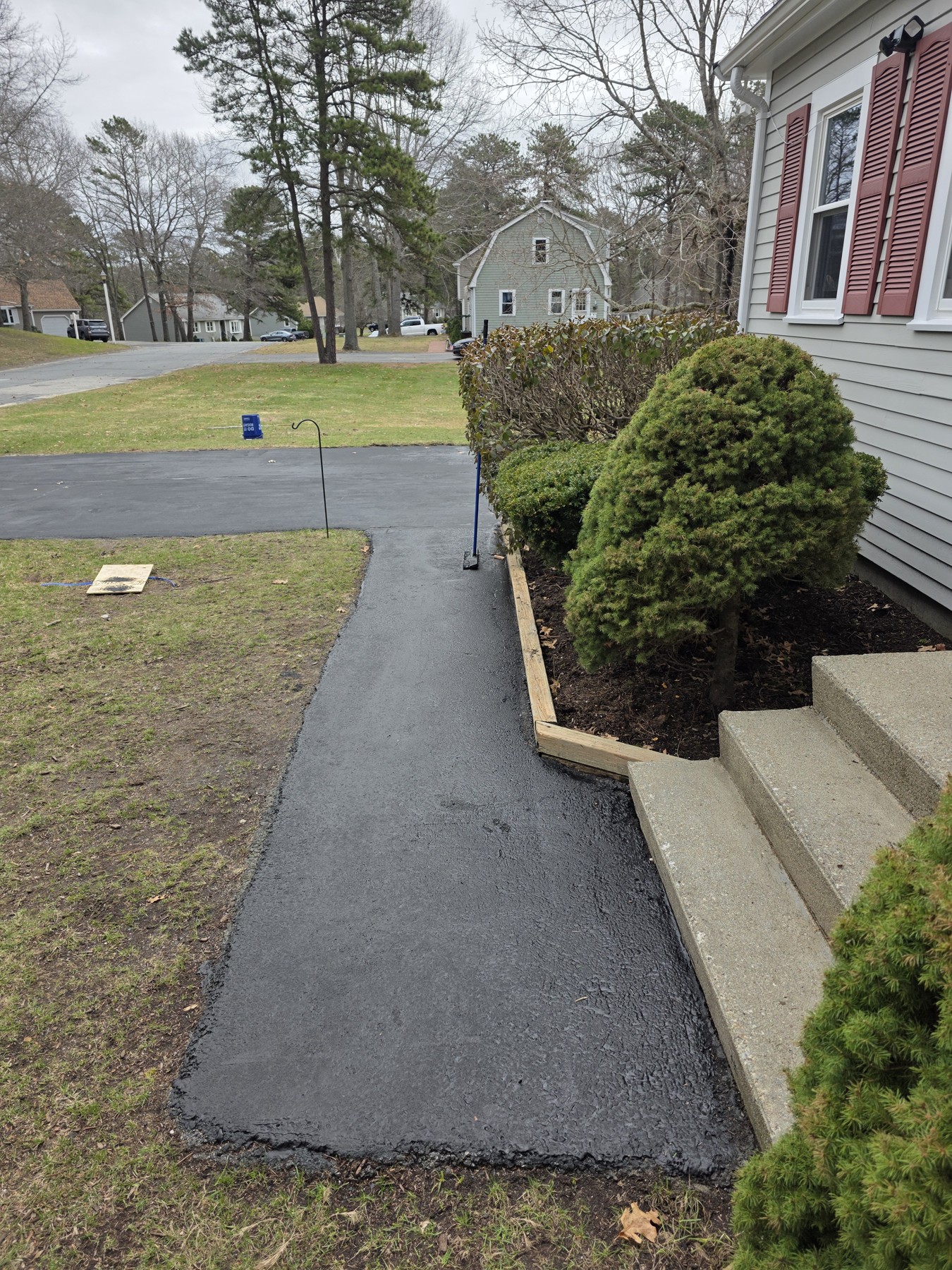 Completed driveway sealcoating, view 1